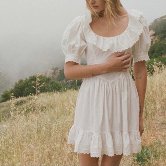 Doen Dresses & Skirts - White Ruffle Mini Dress with Puff Sleeves